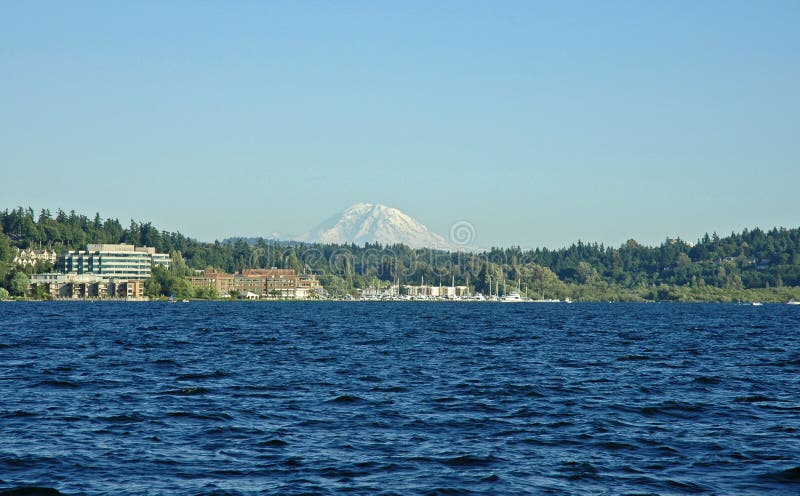 Mount Rainier and Carillon Point from Lake Washington in Kirkland, WA. Mount Rainier and Carillon Point from Lake Washington in Kirkland, WA