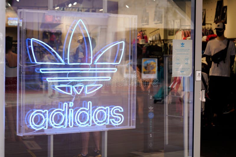 Adidas Logo Sign and Brand Text Front of Sporty Shop Sport Manufactures of  Footwear Editorial Photography - Image of apparel, company: 223350167