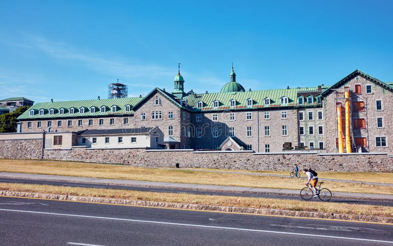 Exterior of historical Hotel-Dieu du Montreal hospital in Quebec, Canada. Montreal, Canada - June, 2018: Exterior of historical Hotel-Dieu du Montreal hospital