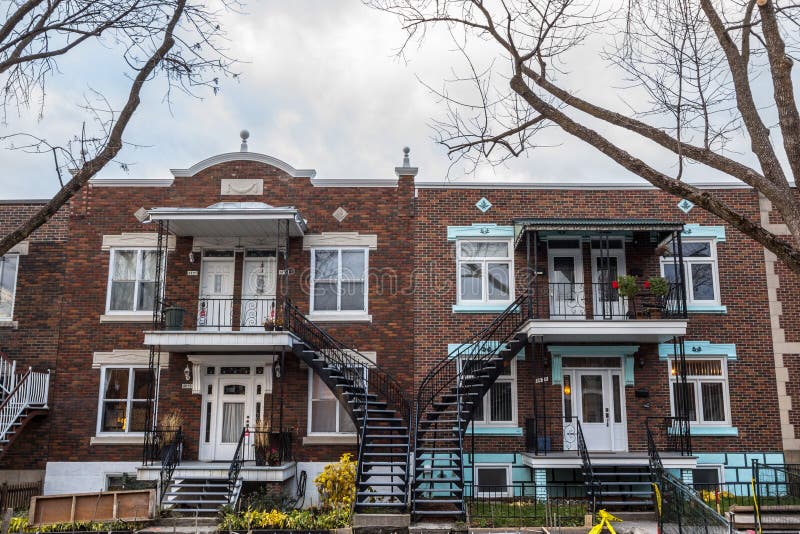 Typical North American red bricks residential houses in autumn in Le Plateau district