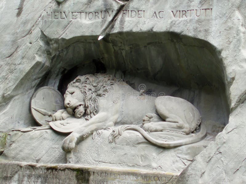The sculptural composition `The Dying Lion`. Lucerne. Switzerland. 05/03/2019. Dedicated to the valor of the fallen Swiss guards at the Tuileries Palace. The lion`s left shoulder is pierced by a spear. The sculptural composition `The Dying Lion`. Lucerne. Switzerland. 05/03/2019. Dedicated to the valor of the fallen Swiss guards at the Tuileries Palace. The lion`s left shoulder is pierced by a spear
