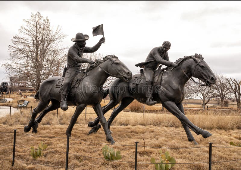 Pictured is the `Centennial Land Run Monument` by artist Paul Moore in Oklahoma City, Oklahoma. The monument commemorates the opening of the Unassigned Land in Oklahoma Territory with the Land Run of 1889. It is one of the worldâ€™s largest bronze sculptures featuring 45 heroic figures of land run participants as they race to claim new homesteads.  The monument is a city park and is open to the public year around 2r hours a day with free admission.  The sculptures were created from bronze and stainless steel between April 2003 and 2015. Pictured is the `Centennial Land Run Monument` by artist Paul Moore in Oklahoma City, Oklahoma. The monument commemorates the opening of the Unassigned Land in Oklahoma Territory with the Land Run of 1889. It is one of the worldâ€™s largest bronze sculptures featuring 45 heroic figures of land run participants as they race to claim new homesteads.  The monument is a city park and is open to the public year around 2r hours a day with free admission.  The sculptures were created from bronze and stainless steel between April 2003 and 2015.