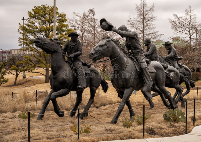 Pictured is the `Centennial Land Run Monument` by artist Paul Moore in Oklahoma City, Oklahoma. The monument commemorates the opening of the Unassigned Land in Oklahoma Territory with the Land Run of 1889. It is one of the worldâ€™s largest bronze sculptures featuring 45 heroic figures of land run participants as they race to claim new homesteads.  The monument is a city park and is open to the public year around 2r hours a day with free admission.  The sculptures were created from bronze and stainless steel between April 2003 and 2015. Pictured is the `Centennial Land Run Monument` by artist Paul Moore in Oklahoma City, Oklahoma. The monument commemorates the opening of the Unassigned Land in Oklahoma Territory with the Land Run of 1889. It is one of the worldâ€™s largest bronze sculptures featuring 45 heroic figures of land run participants as they race to claim new homesteads.  The monument is a city park and is open to the public year around 2r hours a day with free admission.  The sculptures were created from bronze and stainless steel between April 2003 and 2015.