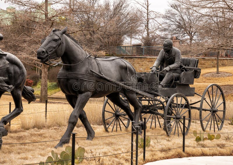 Pictured is the `Centennial Land Run Monument` by artist Paul Moore in Oklahoma City, Oklahoma. The monument commemorates the opening of the Unassigned Land in Oklahoma Territory with the Land Run of 1889. It is one of the worldâ€™s largest bronze sculptures featuring 45 heroic figures of land run participants as they race to claim new homesteads.  The monument is a city park and is open to the public year around 2r hours a day with free admission.  The sculptures were created from bronze and stainless steel between April 2003 and 2015. Pictured is the `Centennial Land Run Monument` by artist Paul Moore in Oklahoma City, Oklahoma. The monument commemorates the opening of the Unassigned Land in Oklahoma Territory with the Land Run of 1889. It is one of the worldâ€™s largest bronze sculptures featuring 45 heroic figures of land run participants as they race to claim new homesteads.  The monument is a city park and is open to the public year around 2r hours a day with free admission.  The sculptures were created from bronze and stainless steel between April 2003 and 2015.