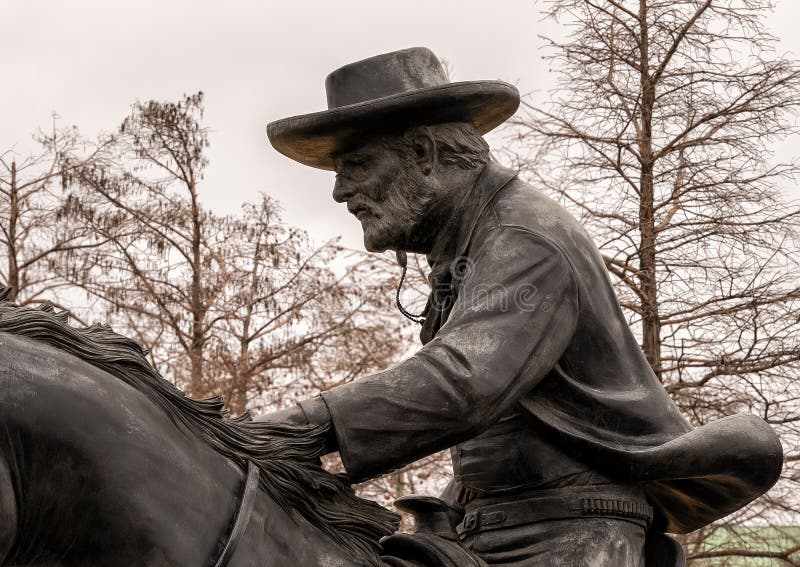 Pictured is the `Centennial Land Run Monument` by artist Paul Moore in Oklahoma City, Oklahoma. The monument commemorates the opening of the Unassigned Land in Oklahoma Territory with the Land Run of 1889. It is one of the worldâ€™s largest bronze sculptures featuring 45 heroic figures of land run participants as they race to claim new homesteads.  The monument is a city park and is open to the public year around 2r hours a day with free admission.  The sculptures were created from bronze and stainless steel between April 2003 and 2015. Pictured is the `Centennial Land Run Monument` by artist Paul Moore in Oklahoma City, Oklahoma. The monument commemorates the opening of the Unassigned Land in Oklahoma Territory with the Land Run of 1889. It is one of the worldâ€™s largest bronze sculptures featuring 45 heroic figures of land run participants as they race to claim new homesteads.  The monument is a city park and is open to the public year around 2r hours a day with free admission.  The sculptures were created from bronze and stainless steel between April 2003 and 2015.