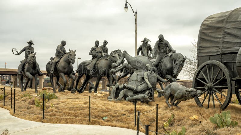 Pictured is the `Centennial Land Run Monument` by artist Paul Moore in Oklahoma City, Oklahoma. The monument commemorates the opening of the Unassigned Land in Oklahoma Territory with the Land Run of 1889. It is one of the worldâ€™s largest bronze sculptures featuring 45 heroic figures of land run participants as they race to claim new homesteads.  The monument is a city park and is open to the public year around 2r hours a day with free admission.  The sculptures were created from bronze and stainless steel between April 2003 and 2015. Pictured is the `Centennial Land Run Monument` by artist Paul Moore in Oklahoma City, Oklahoma. The monument commemorates the opening of the Unassigned Land in Oklahoma Territory with the Land Run of 1889. It is one of the worldâ€™s largest bronze sculptures featuring 45 heroic figures of land run participants as they race to claim new homesteads.  The monument is a city park and is open to the public year around 2r hours a day with free admission.  The sculptures were created from bronze and stainless steel between April 2003 and 2015.