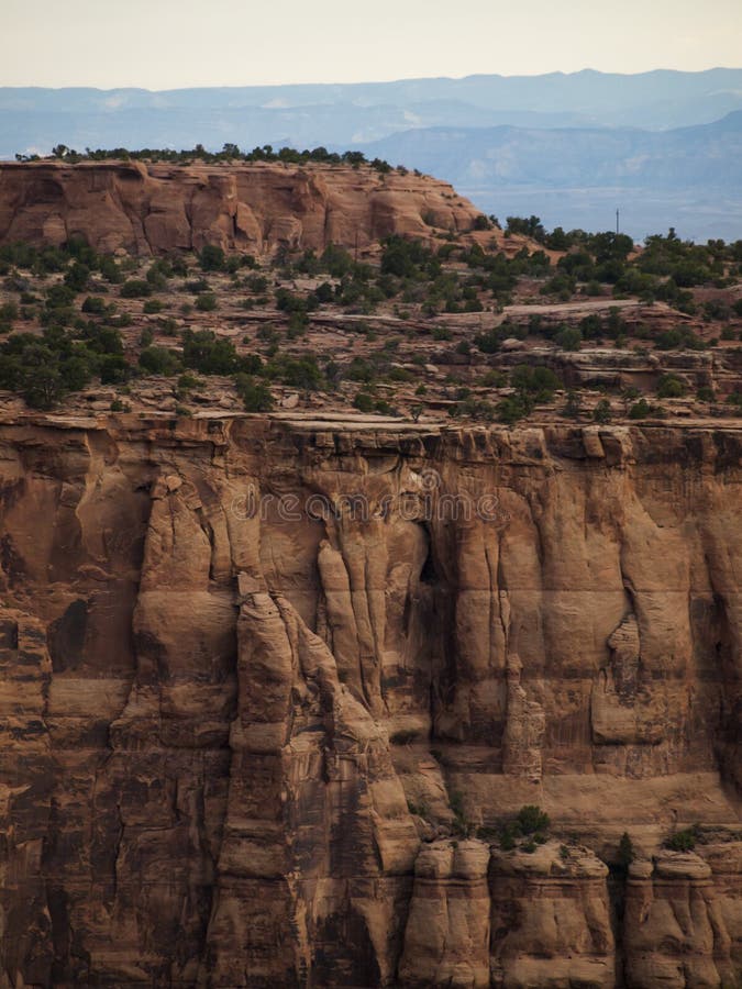Colorado National Monument is a part of the National Park Service near the city of Grand Junction, Colorado. Spectacular canyons cut deep into sandstone and even granite–gneiss–schist rock formations, in some areas. Colorado National Monument is a part of the National Park Service near the city of Grand Junction, Colorado. Spectacular canyons cut deep into sandstone and even granite–gneiss–schist rock formations, in some areas.