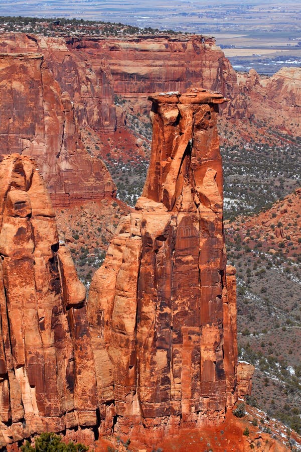 Rock monolith towering over the valley at Colorado National Monument. Rock monolith towering over the valley at Colorado National Monument.