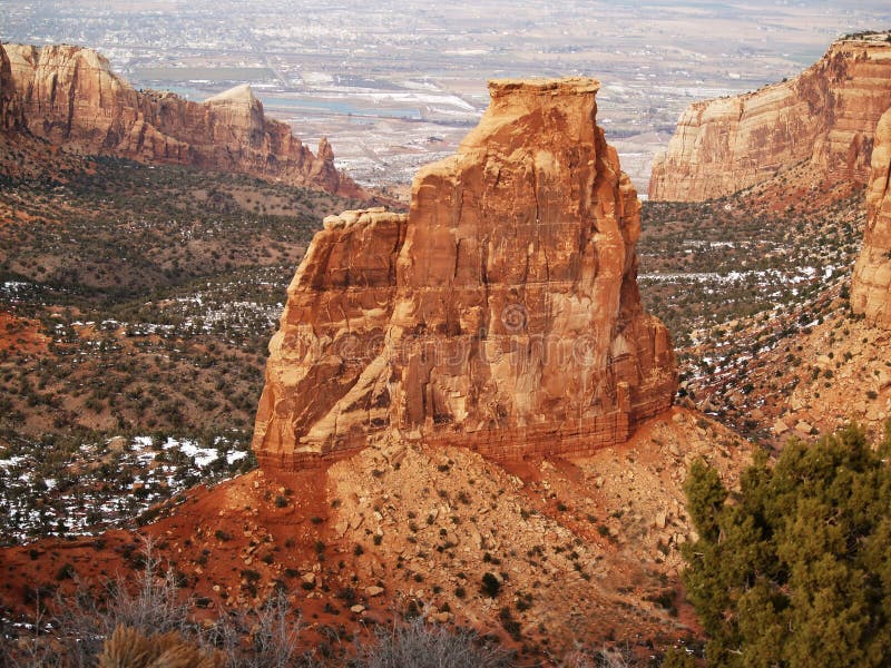 Winter view of the Colorado National Monument monolith in Grand Junction Colorado with the valley in the background. Winter view of the Colorado National Monument monolith in Grand Junction Colorado with the valley in the background.