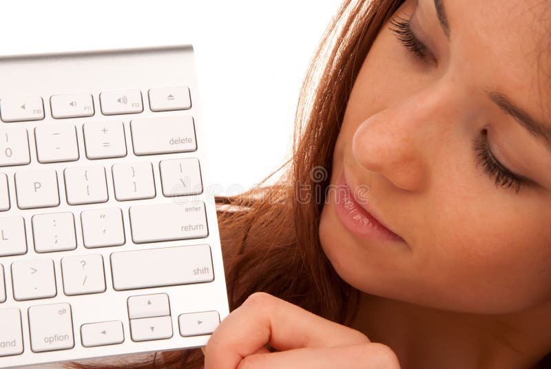 Mooi jong vrouw en toetsenbord stock afbeeldingen Mooi jong vrouw en toetsenbord stock afbeeldingen