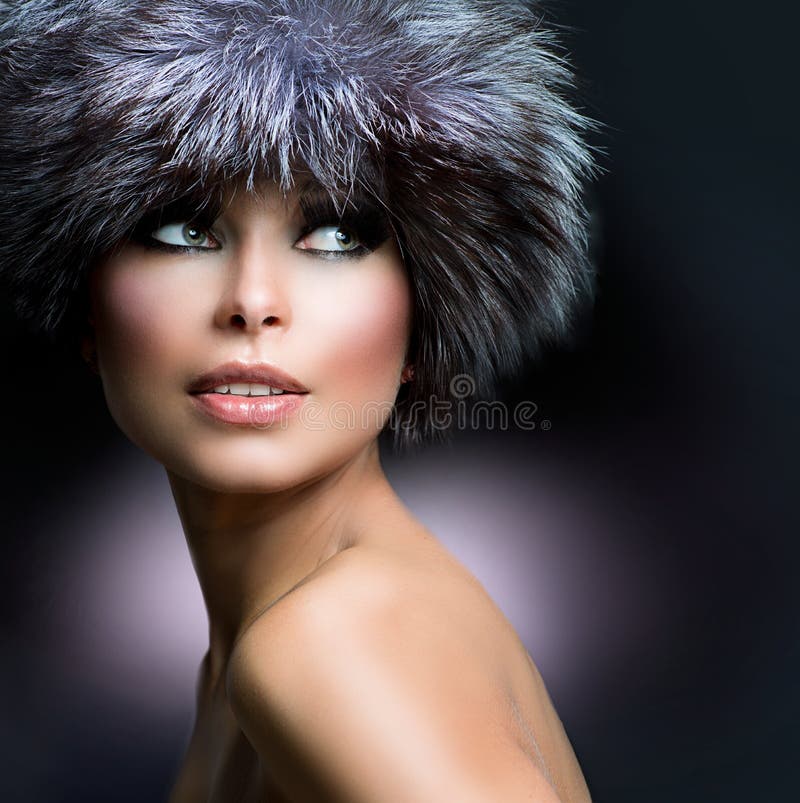 Fashion. Beautiful Girl in Fur Hat. Winter Woman. Fashion. Beautiful Girl in Fur Hat. Winter Woman