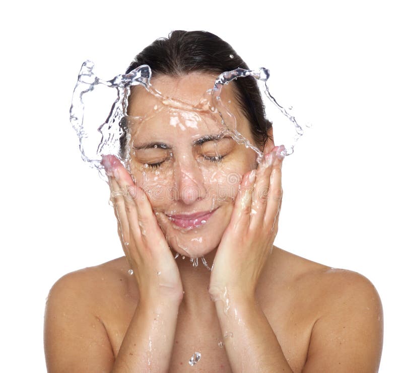 Mooi nat vrouwengezicht met waterdaling stock afbeelding Mooi nat vrouwengezicht met waterdaling stock afbeelding