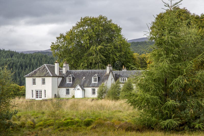 landscape with beautiful old big rural house in scotland. landscape with beautiful old big rural house in scotland
