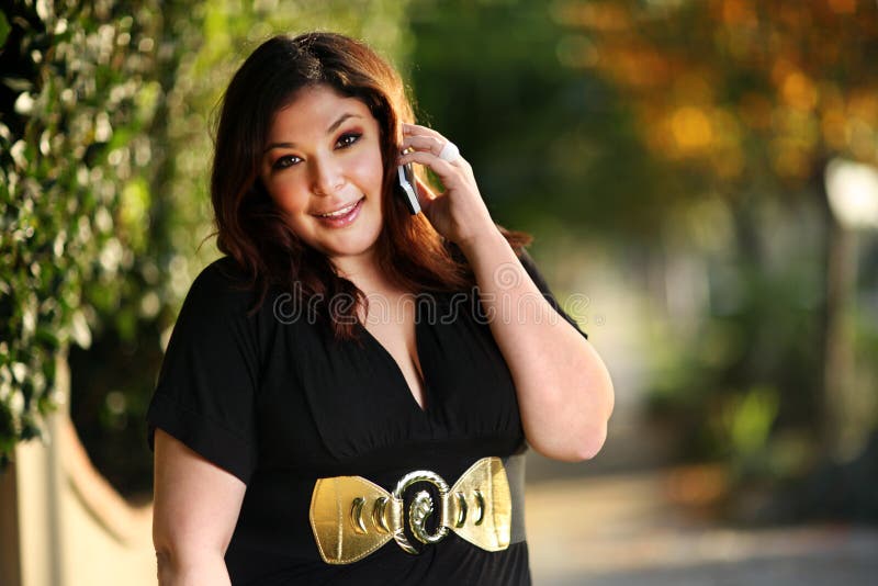 Beautiful plus size model outdoors. Shallow DOF. Beautiful plus size model outdoors. Shallow DOF.