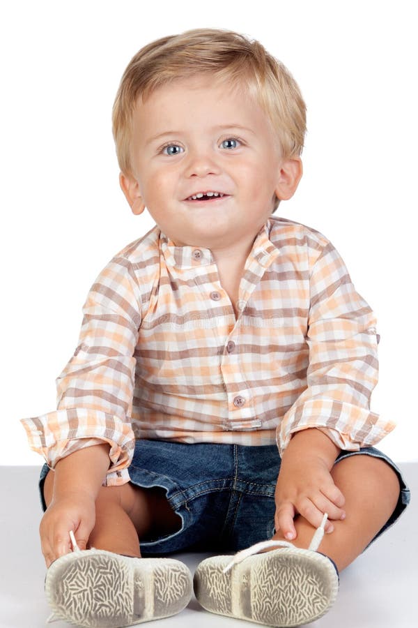 Mooie blonde baby met blauwe ogen stock foto Mooie blonde baby met blauwe ogen stock foto