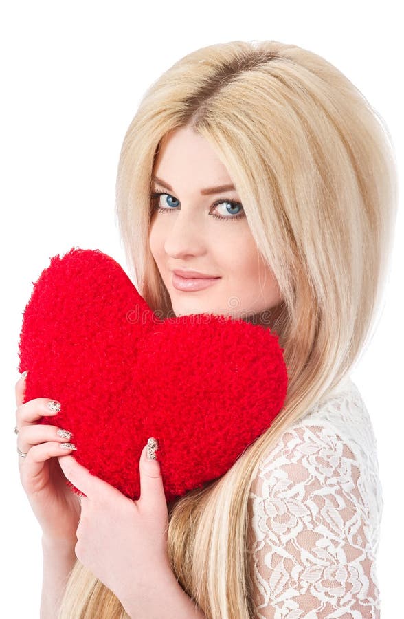 Mooie blondevrouw die rood hart houden stock fotografie Mooie blondevrouw die rood hart houden stock fotografie