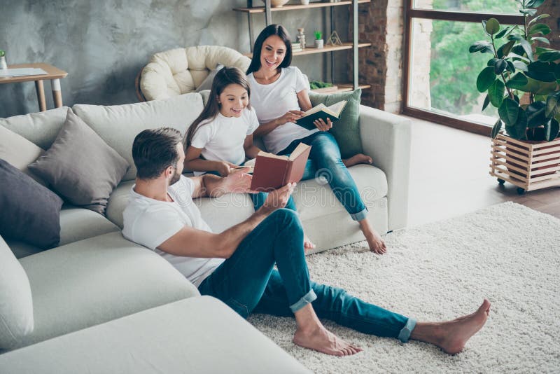 Nice attractive charming friendly adorable cheerful idyllic glad brunette family schoolgirl wearing, casual white t-shirts jeans spending free time at industrial loft style interior living-room indoor. Nice attractive charming friendly adorable cheerful idyllic glad brunette family schoolgirl wearing, casual white t-shirts jeans spending free time at industrial loft style interior living-room indoor