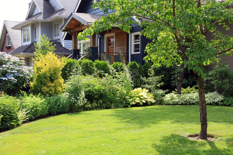 Beautiful home surrounded by a lush perennial front garden. Beautiful home surrounded by a lush perennial front garden.