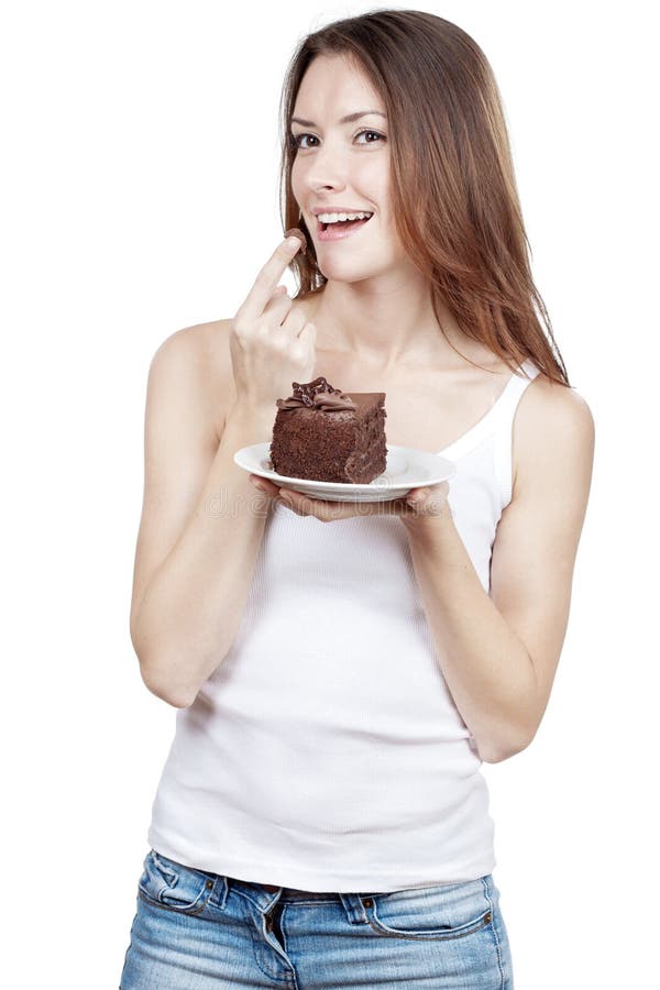 Mooie jonge vrouw die chocoladecake eten stock afbeelding Mooie jonge vrouw die chocoladecake eten stock afbeelding
