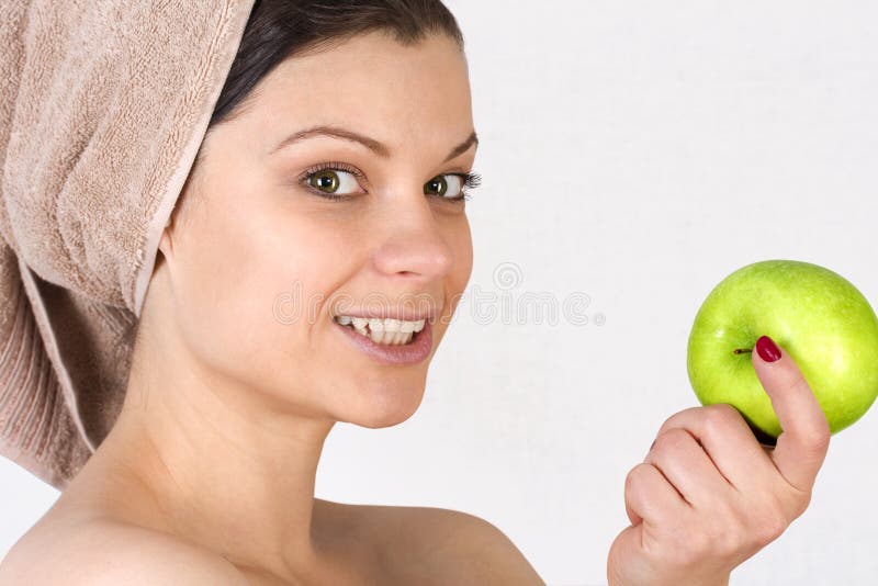 Mooie jonge vrouw met een appel. royalty-vrije stock foto