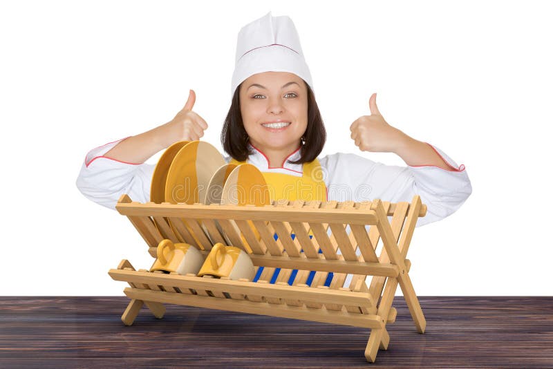 Mooie Jonge Vrouwenchef-kok Show Thumbs Up dichtbij Di van de Bamboekeuken stock fotografie Mooie Jonge Vrouwenchef-kok Show Thumbs Up dichtbij Di van de Bamboekeuken stock fotografie