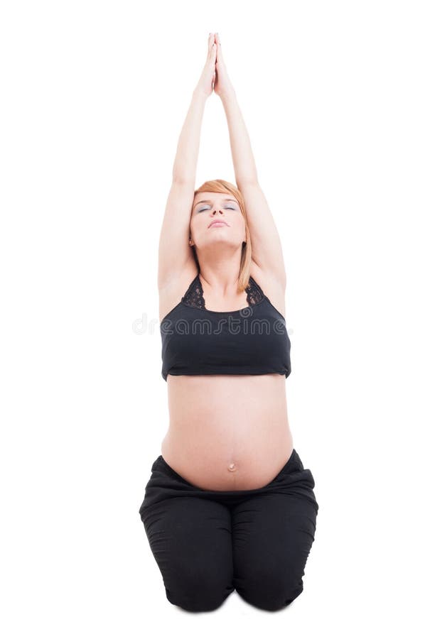 Mooie jonge zwangere vrouw het praktizeren yoga die op wit wordt geïsoleerd stock afbeelding Mooie jonge zwangere vrouw het praktizeren yoga die op wit wordt geïsoleerd stock afbeelding