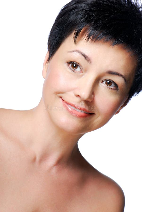 Portrait of smiling beautiful mid adult woman with healthy skin. Portrait of smiling beautiful mid adult woman with healthy skin