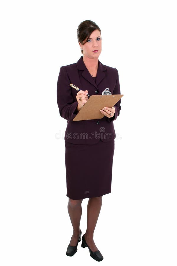 Beautiful Businesswoman Taking Notes. Holding pen and clipboard. Disapointed expression. Shot in studio. Beautiful Businesswoman Taking Notes. Holding pen and clipboard. Disapointed expression. Shot in studio.