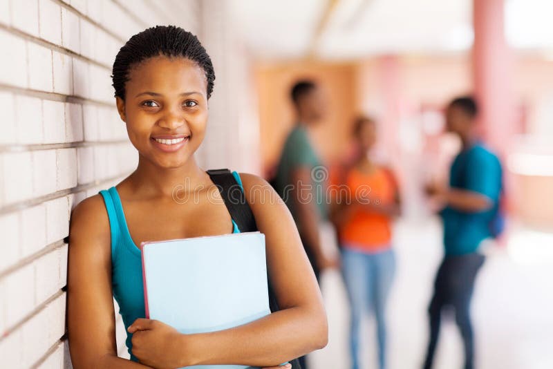 Beautiful african college student with books. Beautiful african college student with books