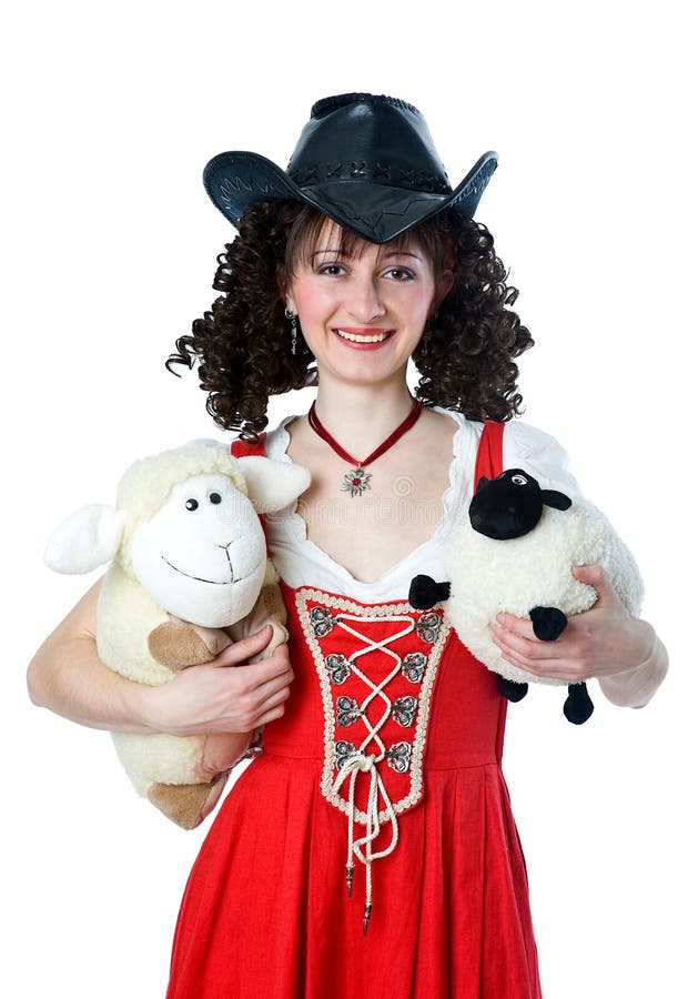 Mooie vrouw in cowboyhoed met het speelgoed stock afbeeldingen Mooie vrouw in cowboyhoed met het speelgoed stock afbeeldingen