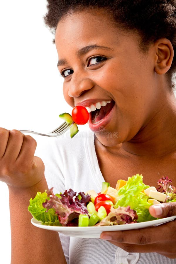 Mooie vrouw die een salade eten stock afbeeldingen Mooie vrouw die een salade eten stock afbeeldingen