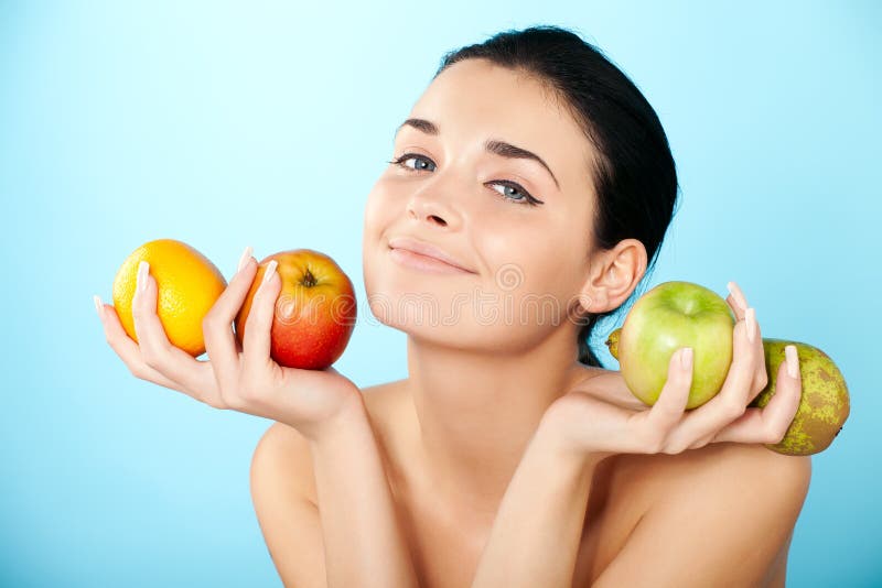 Mooie vrouw met fruit royalty-vrije stock afbeelding