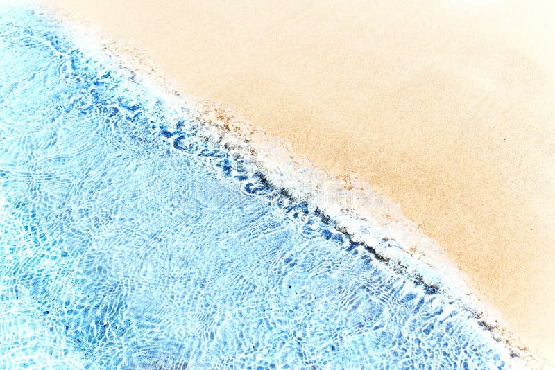 Beautiful soft waves of Blue Ocean with Sandy Beach Background close up. Sea sand wallpaper. Beautiful soft waves of Blue Ocean with Sandy Beach Background close up. Sea sand wallpaper