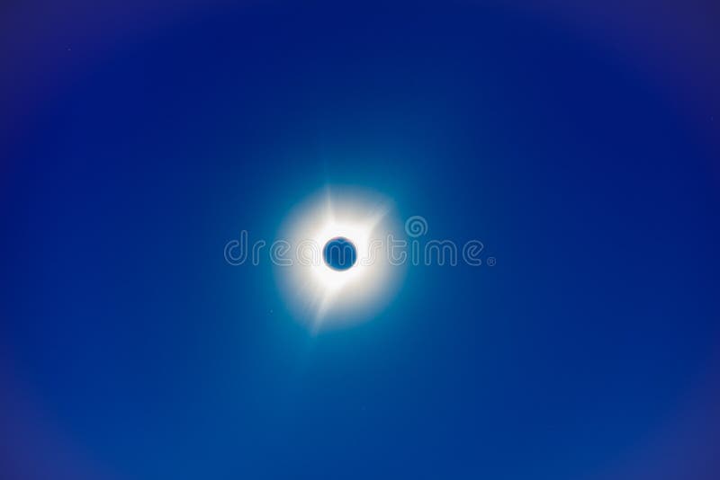 The Moon Covers the Sun in a Beautiful Solar Eclipse, Bright Stars in