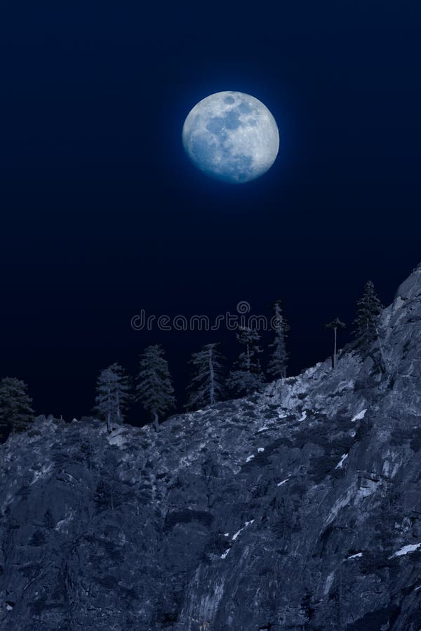 Moon over mountainside