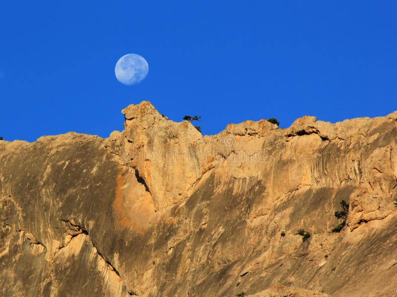 Moon over mountain