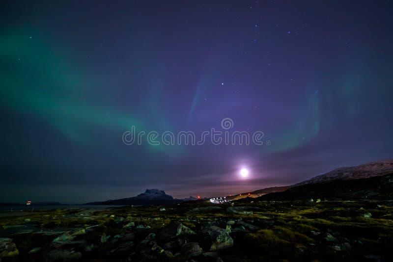 Moon shining and the northern lights, nearby Nuuk, Greenland royalty free stock photo Moon shining and the northern lights, nearby Nuuk, Greenland royalty free stock photo