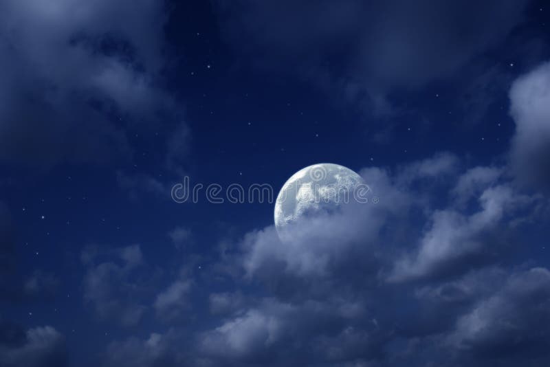 Moon and stars in cloudy sky