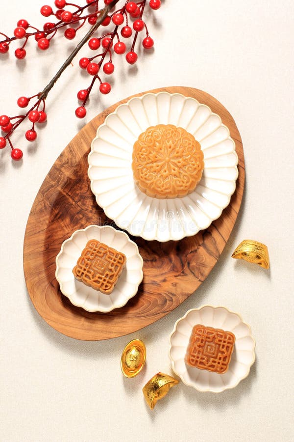 Mooncake on Light Background with Tea. Concept Moon Cake on Mid Autumn Festival or Chinese New year Imlek. Mooncake Popular as