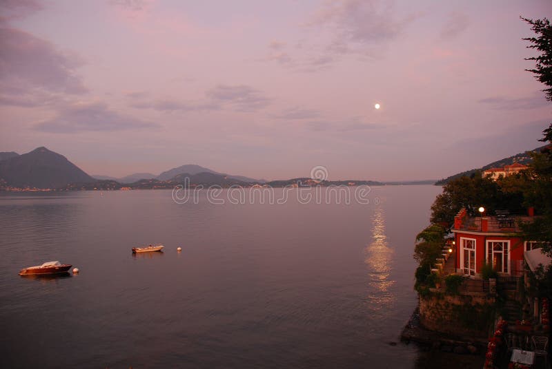 Moonlight reflection on the lake Maggiore waters. seen from isola dei Pescatori, Piemonte, Italy. Moonlight reflection on the lake Maggiore waters. seen from isola dei Pescatori, Piemonte, Italy.