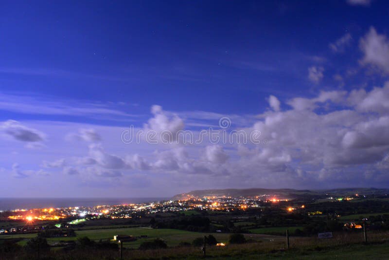 Moonlit Cloudscape Over Sandown Bay royalty free stock image