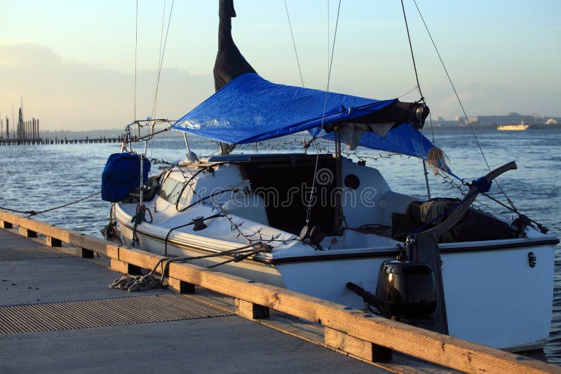 A moored boat at sunset.