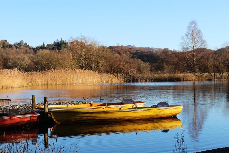 Moored rowing boats in winter sunshine, Grasmere