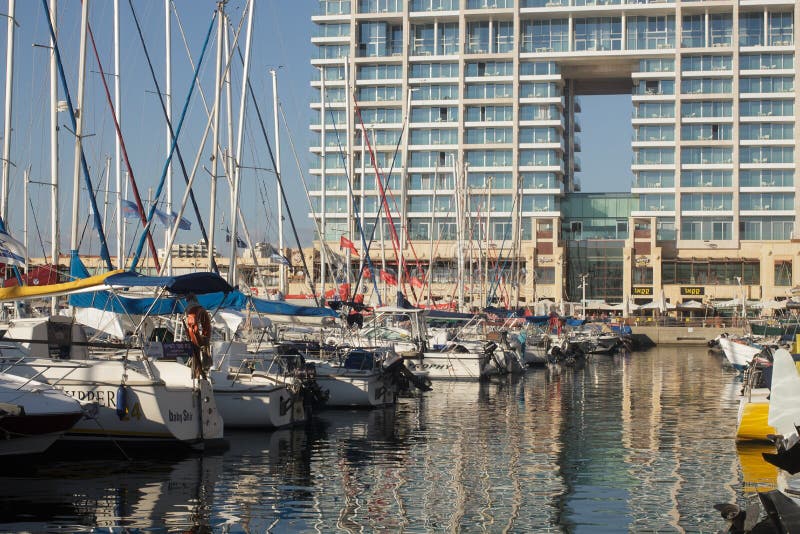 Moored Yachts, Ritz Carlton and mirror reflection in Herzelya Marina