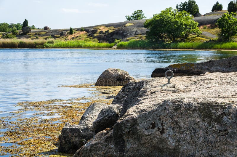 Mooring ring on a stone royalty free stock image