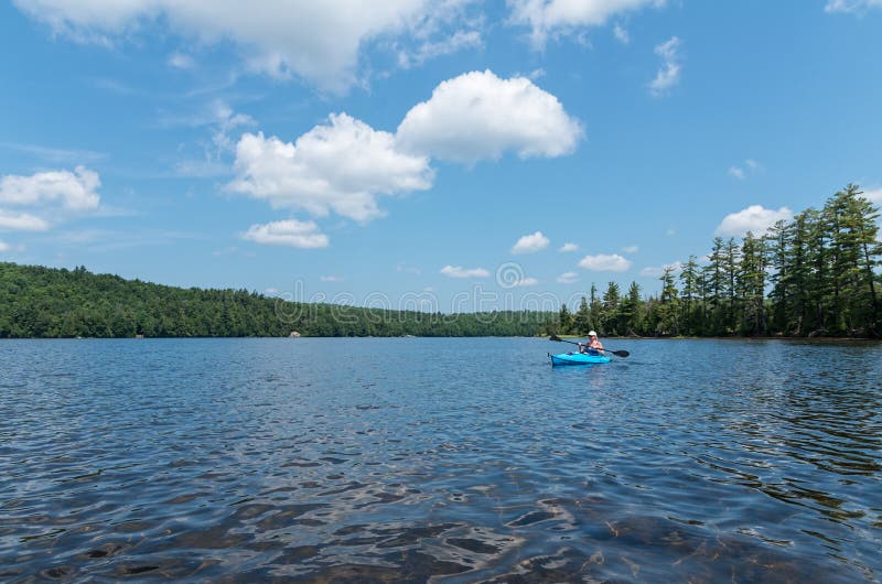 Moose Pond Female Kayak in Saranac Lake NY Stock Photo Image of