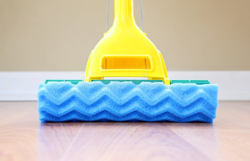 A close up of a mop on the floor