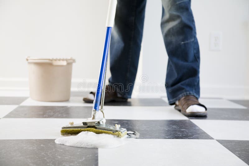 Mopping floor stock photography