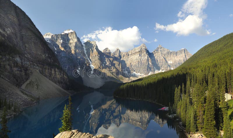 Moraine Lake Reflecting the Surrounding Mountains stock photo Moraine Lake Reflecting the Surrounding Mountains stock photo