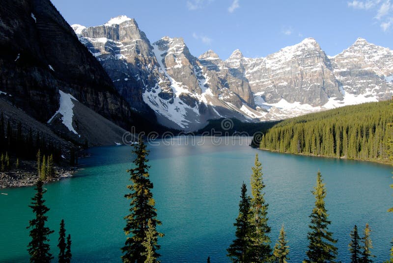 Emerald green Moraine Lake in the morning,Canadian Rockies (inscribed on the UNESCO World Heritage list),Canada. Emerald green Moraine Lake in the morning,Canadian Rockies (inscribed on the UNESCO World Heritage list),Canada